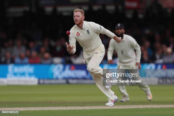 Ben Stokes of England celebrates taking a catch off his own bowling to dismiss Kieran Powell of West Indies during day one of the 1st Investec Test...