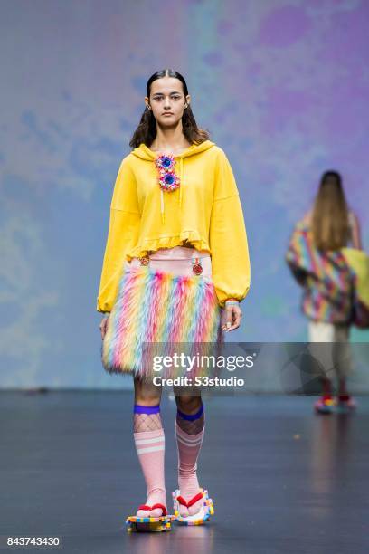 Model showcases designs by POURQUOI on the runway during the Designers' Collection Show 2 - MACAO FASHION PARADE on the Day 2 of the CentreStage Hong...