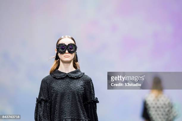 Model showcases designs by POURQUOI on the runway during the Designers' Collection Show 2 - MACAO FASHION PARADE on the Day 2 of the CentreStage Hong...