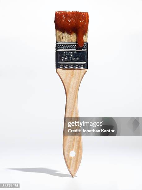 paintbrush with bbq sauce - basted stock pictures, royalty-free photos & images