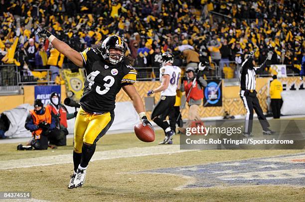 Troy Polamalu of the Pittsburgh Steelers returns an interception for a touchdown in the 4th quarter against the Baltimore Ravens during the AFC...
