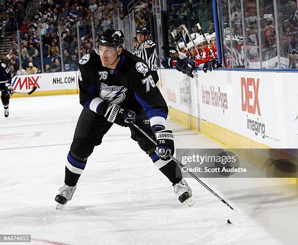 Evgeny Artyukhin of the Tampa Bay Lightning shoots the puck against the Florida Panthers at the St. Pete Times Forum on January 17, 2009 in Tampa,...