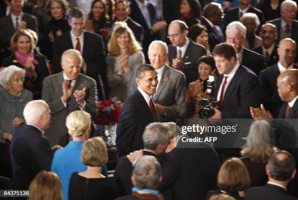 President Barack Obama arrives at a luncheon at Statuary Hall in the U. Capitol in Washington, DC, January 20, 2009.