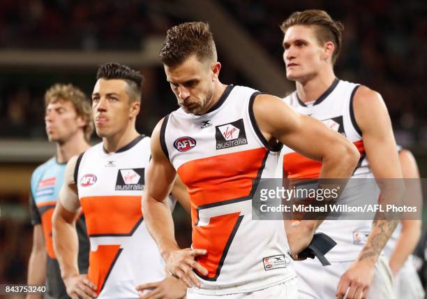 Brett Deledio of the Giants looks dejected after a loss during the AFL First Qualifying Final match between the Adelaide Crows and the Greater...