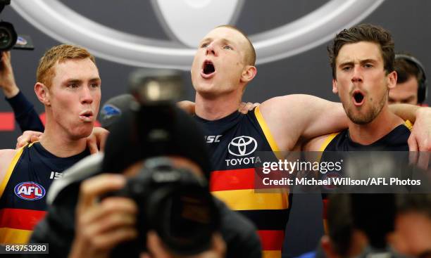 Sam Jacobs of the Crows sings the team song during the AFL First Qualifying Final match between the Adelaide Crows and the Greater Western Sydney...