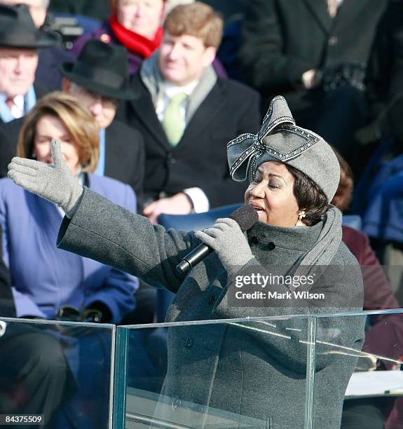 Aretha Franklin sings during the inauguration of Barack Obama as the 44th President of the United States of America on the West Front of the Capitol...