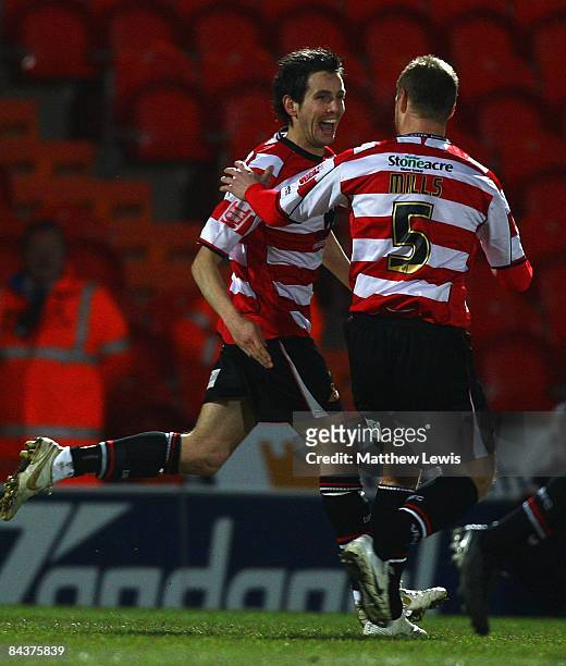 Brian Stock of Doncaster celebrates his goal with team mate Matt Mills during the FA Cup sponsored by E.on Third round Replay match betweeen...