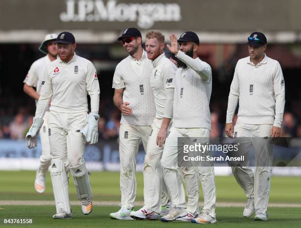Ben Stokes of England celebrates with teammates after taking the wicket of Shane Dowrich of West Indies during day one of the 1st Investec Test match...