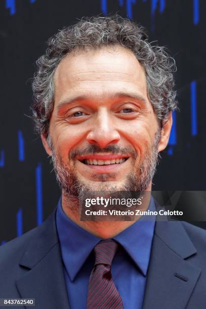 Claudio Santamaria walks the red carpet ahead of the 'Brutti E Cattivi' screening during the 74th Venice Film Festival at Sala Darsena on September...