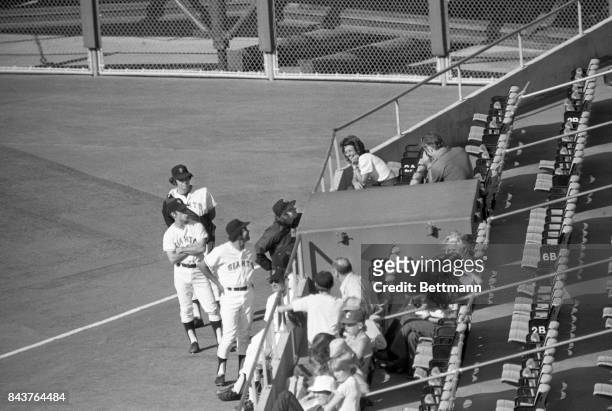 Wimbledon tennis champ, Billie Jean King, draws fans even from amongst the other pros as she attends the game between the San Francisco Giants and...
