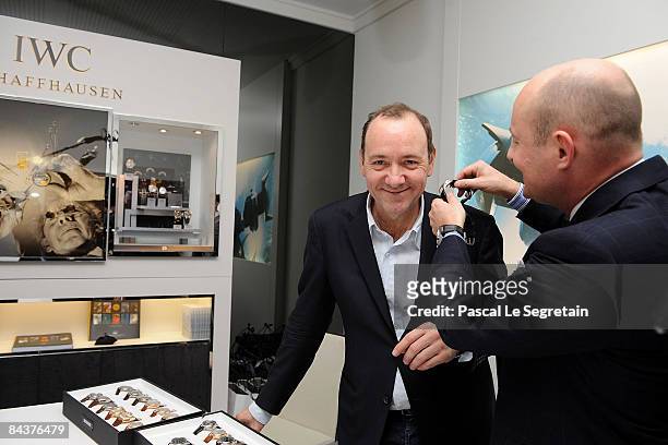 Kevin Spacey and Georges Kern, CEO of IWC Schaffhausen visit the IWC Schaffhausen booth during the Salon International de la Haute Horlogerie at...