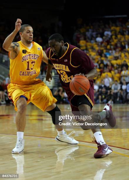 James Harden of Arizona State dribble drives to the basket against Daniel Hackett of USC during first half of the game at Galen Center on January 15,...