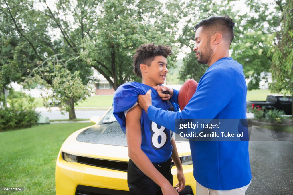 Father encouraging his teen son