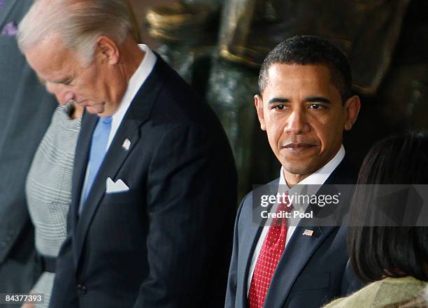 President Barack Obama and U.S. Vice-President Joe Biden during a luncheon at Statuary Hall in the U.S. Capitol on January 20, 2009 in Washington,...