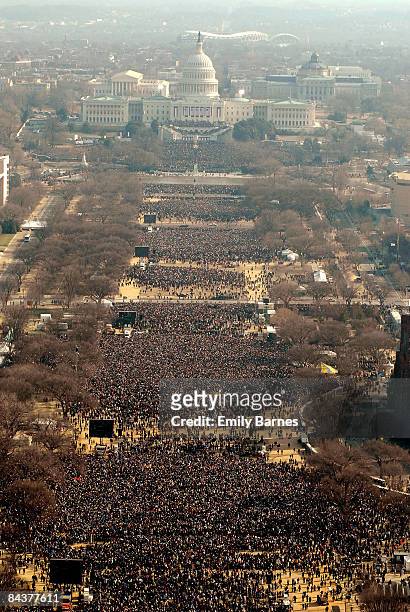 Crowds look towards the Capitol during the inauguration of Barack Obama as the 44th President of the United States of America on the National Mall...