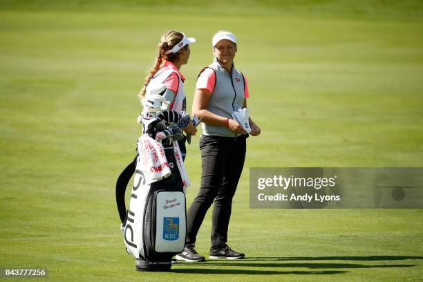 Brooke Henderson of Canada waits to hit her second shot on the 9th hole during the first round of the Indy Women In Tech Championship-Presented By...