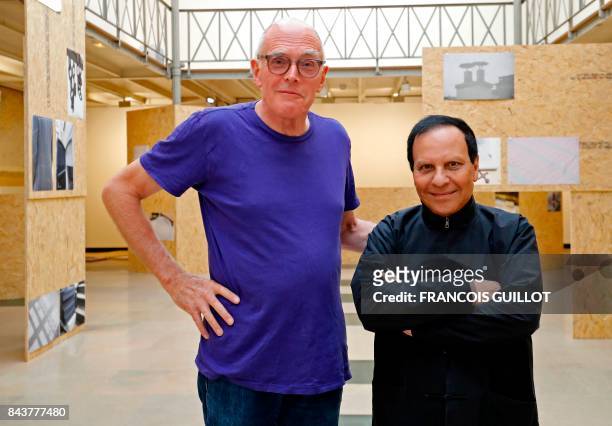 Britain's artist Richard Wentworth and Franco-Tunisian fashion designer Azzedine Alaia pose during an exposition of Wentworth's photographic work on...