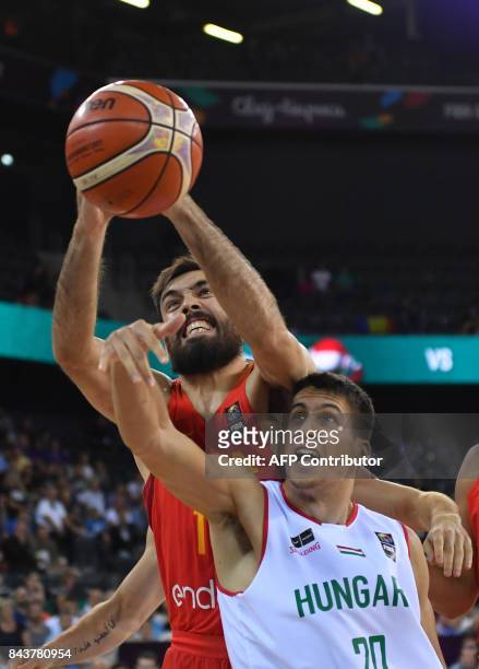 Zoltan Perl of Hungary vies with Pierre Oriola of Spain during Group C of the FIBA Eurobasket 2017 mens basketball match between Hungary and Spain in...
