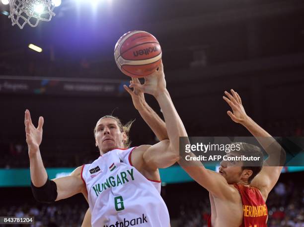 Akos Keller of Hungary vies with Juancho Hernangomez of Spain during Group C of the FIBA Eurobasket 2017 mens basketball match between Hungary and...