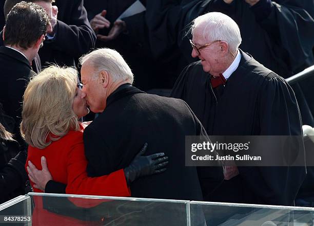 Vice President-elect Joseph R. Biden kisses his wife Jill after being sworn in by Supreme Court Justice John Paul Stevens during the inauguration of...