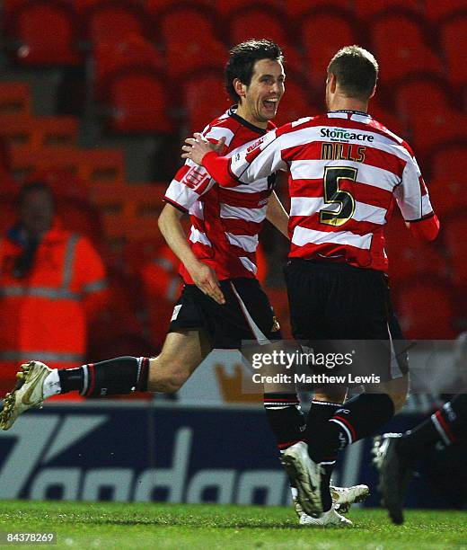 Brian Stock of Doncaster celebrates his goal with team mate Matt Mills during the FA Cup sponsored by E.on third round replay match between Doncaster...