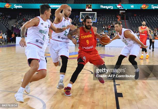 Andras Rujak , Janos Eilingsfeld and Csaba Ferencz of Hungary vie with Ricky Rubio of Spain during Group C of the FIBA Eurobasket 2017 mens...
