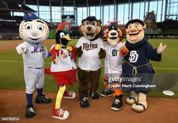 Major League Baseball mascots Mr. Met , Fredbird , T. C. Bear , Paws and Swinging Friar pose for a photo during the 2017 Gatorade All-Star Workout...