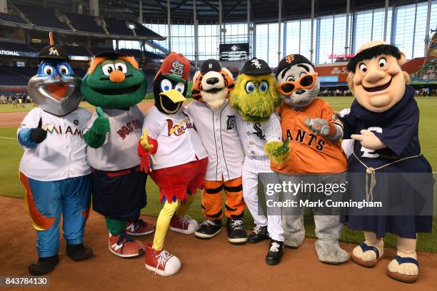 Major League Baseball mascots Billy the Marlin , Wally The Green Monster , Fredbird , Paws , Southpaw , Lou Seal and Swinging Friar pose for a photo...