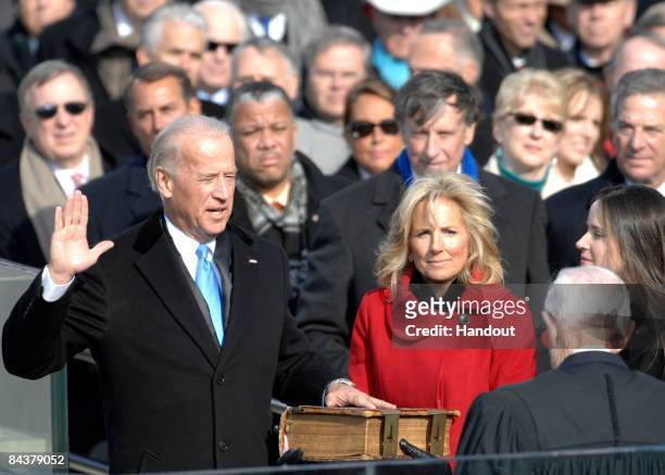 Joe Biden, with wife Jill Biden at his side, is sworn in as vice president of the United States by Supreme Court Justice John Paul Stevens at the...