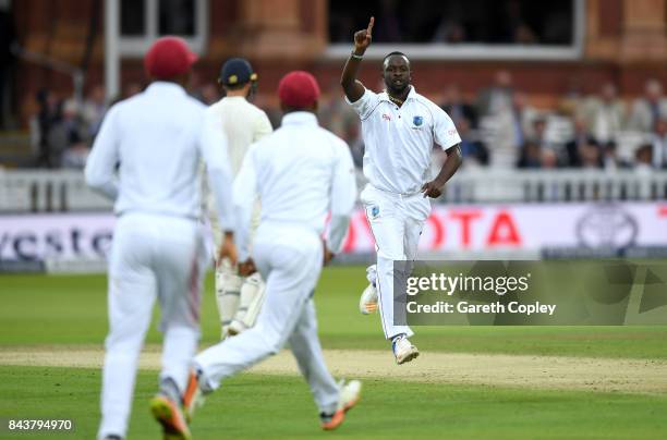 Kemar Roach of the West Indies celebrates dismissing Alastair Cook of England during day one of the 3rd Investec Test match between England and the...