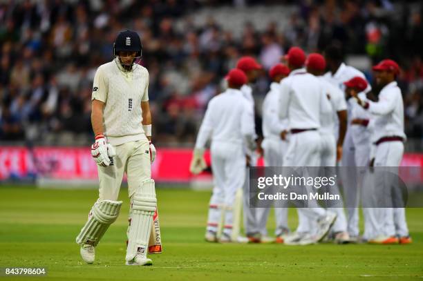 Joe Root of England leaves the field after being dismissed by Jason Holder of the West Indies during day one of the 3rd Investec Test Match between...