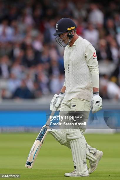 Tom Westley of England walks off after being dismissed by Jason Holder of West Indies during day one of the 1st Investec Test match between England...