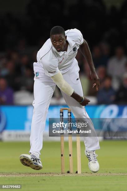 Jason Holder of West Indies bowls during day one of the 1st Investec Test match between England and West Indies at Lord's Cricket Ground on September...