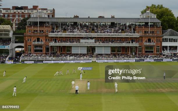 Ben Stokes of England looks on as Kemar Roach of the West Indies is dismissed during the third cricket test between England and the West Indies at...