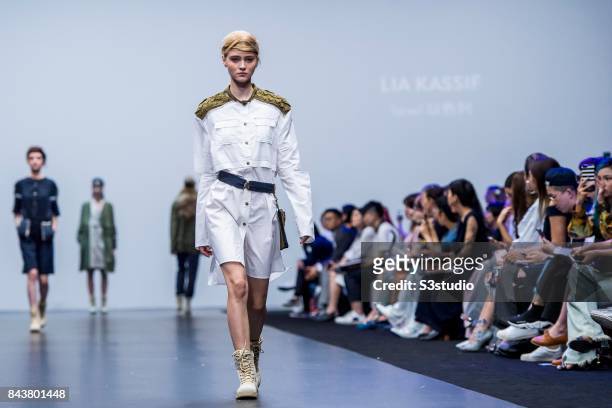 Model showcases designs by Lia Kassif on the runway during the Redress: The EcoChic Design Award 2017: Grand Final Fashion Show on the Day 2 of the...