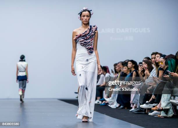 Model showcases designs by Claire Dartigues on the runway during the Redress: The EcoChic Design Award 2017: Grand Final Fashion Show on the Day 2 of...