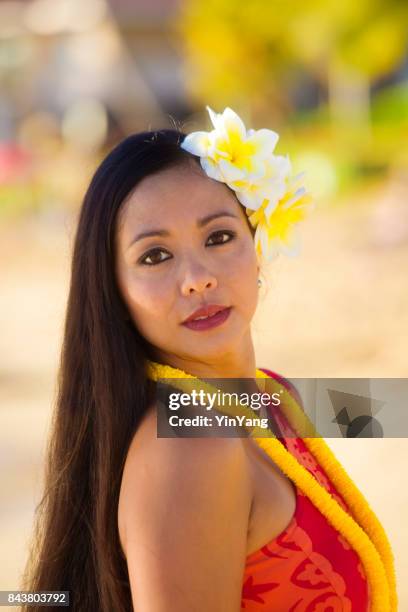 portrait of hawaiian hula dancer on the beach at sunset - hawaiian print dress stock pictures, royalty-free photos & images