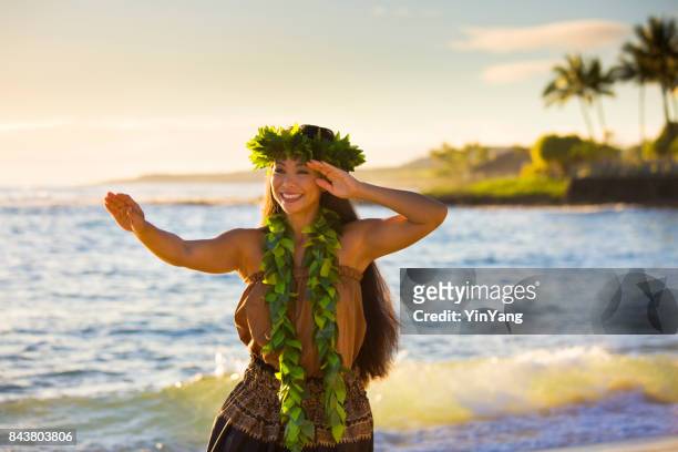 hawaiian hula dancer dancing on the beach of kauai hawaii - hula dancing stock pictures, royalty-free photos & images
