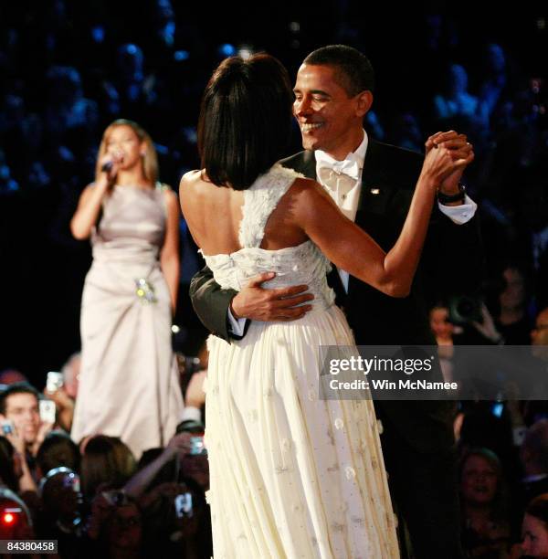 President Barack Obama dances with his wife and First Lady Michelle Obama as Beyonce sings "At Last" during the first Inaugural Ball on January 20,...