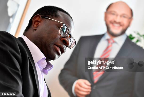 Senegalese-born German MP for the Social Democratic Party Karamba Diaby speaks during an interview in the SPD headquarters in Halle on September 6,...