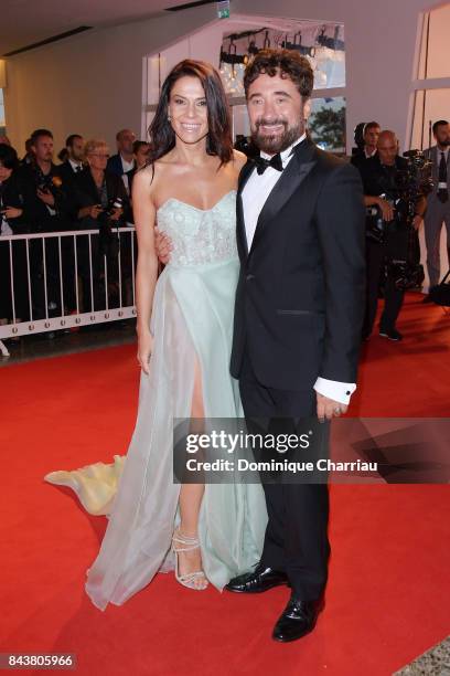 Giglia Marra and Federico Zampaglione walk the red carpet ahead of the 'Mektoub, My Love: Canto Uno' screening during the 74th Venice Film Festival...