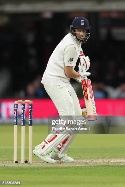 Joe Root of England looks behind to see he's been caught by slip fielder Kieran Powell of West Indies during day one of the 1st Investec Test match...