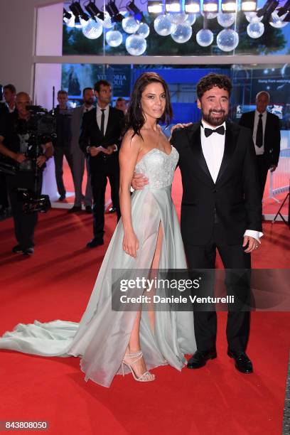 Giglia Marra and Federico Zampaglione walk the red carpet ahead of the 'Mektoub, My Love: Canto Uno' screening during the 74th Venice Film Festival...