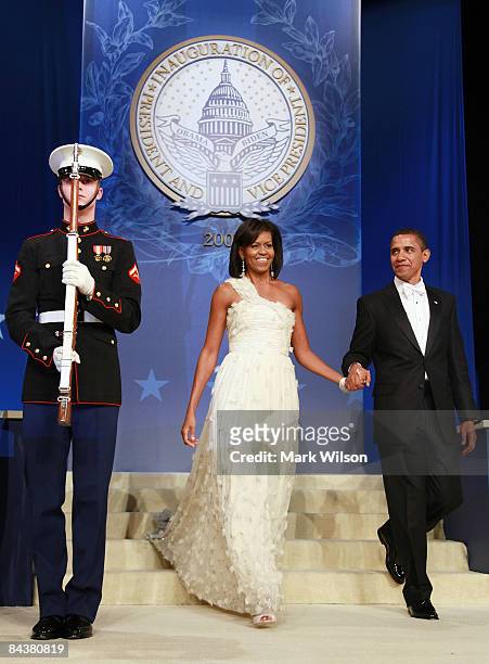 President Barack Obama and his wife Michelle arrive at the Obama Homes States Ball, one of ten official inaugural balls January 20, 2009 in...