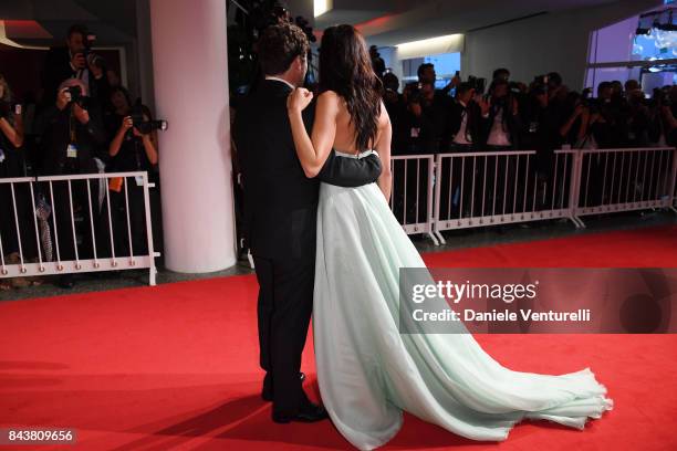 Giglia Marra and Federico Zampaglione walk the red carpet ahead of the 'Mektoub, My Love: Canto Uno' screening during the 74th Venice Film Festival...