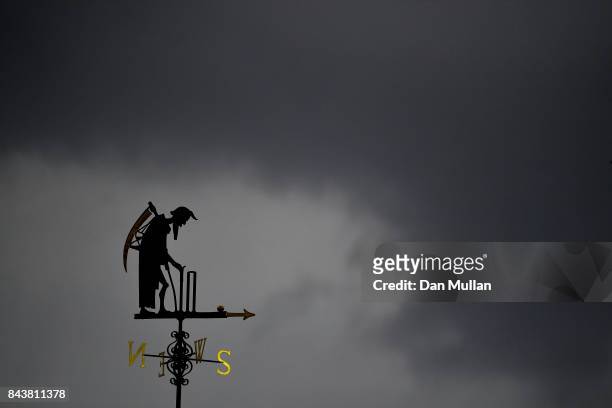 Old Father Time is seen against stormy skies during day one of the 3rd Investec Test Match between England and the West Indies at Lord's Cricket...