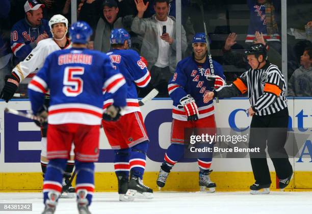 Referee Kerry Fraser signals the game winning goal by Scott Gomez of the New York Rangers against the Anaheim Ducks on January 20, 2009 at Madison...
