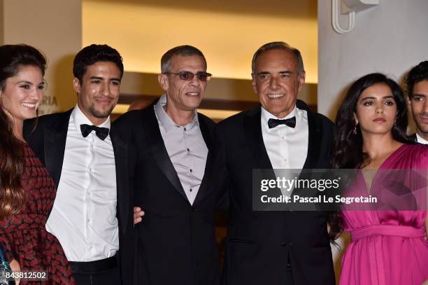 Alexia Chardard, Ophelie Bau, Shain Boumedine, Abdellatif Kechiche, Alberto Barbera, Hafsia Herzi and Salim Kechiouche walk the red carpet ahead of...