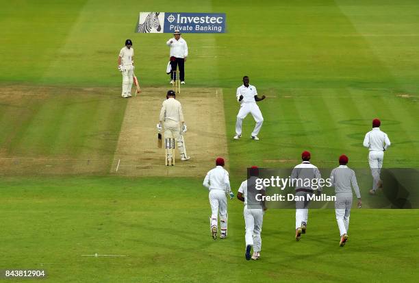 Jason Holder of the West Indies celebrates taking the wicket of Tom Westley of England during day one of the 3rd Investec Test Match between England...