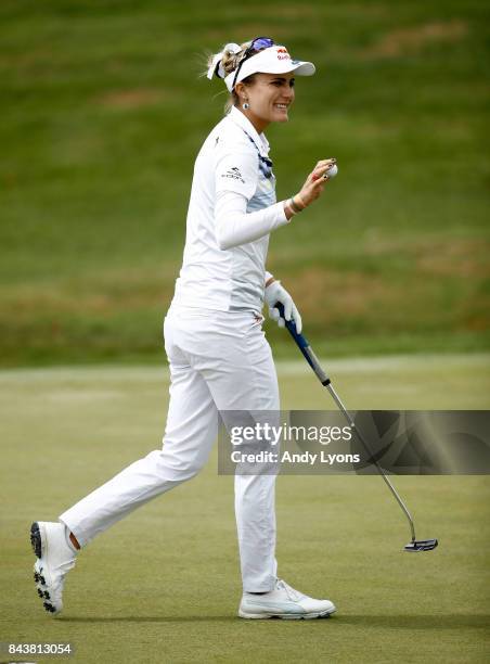 Lexi Thompson waves to the crowd after making a birdie on the 9th hole during the first round of the Indy Women In Tech Championship-Presented By...